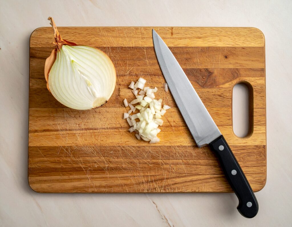how to cut an onion without crying, onion tears, onion cutting tricks, why onions make you cry