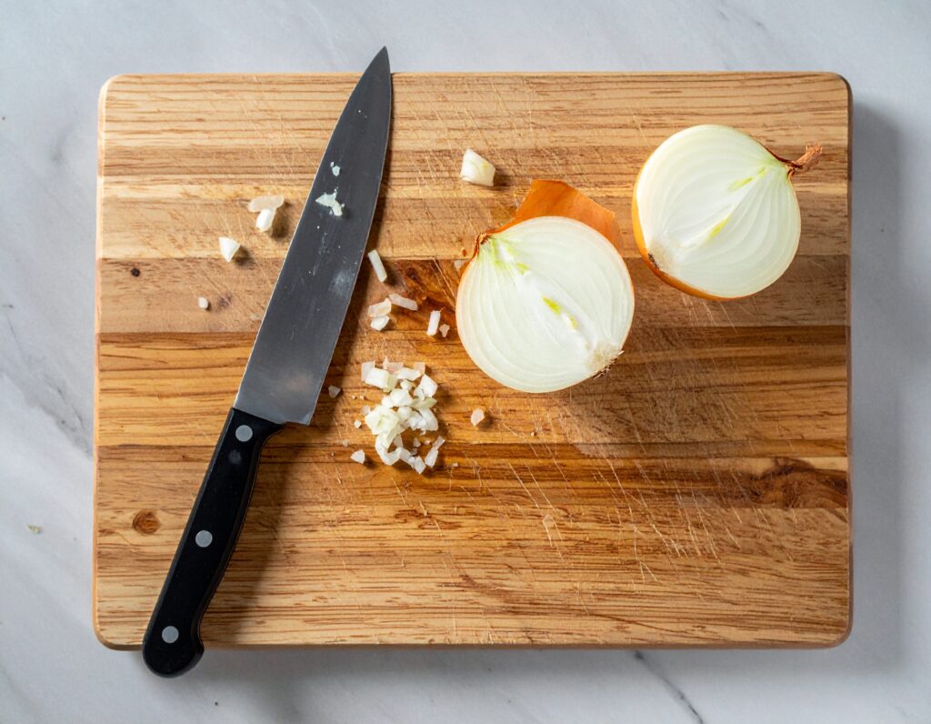 how to cut an onion without crying, onion tears, onion cutting tricks, why onions make you cry