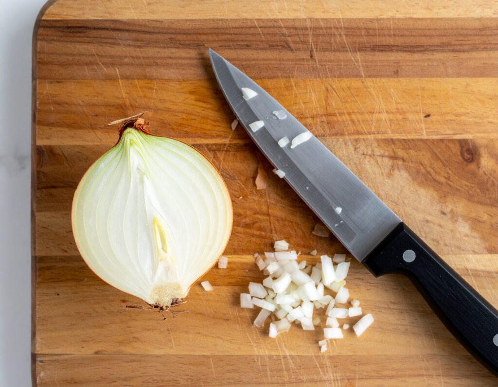 how to cut an onion without crying, onion tears, onion cutting tricks, why onions make you cry