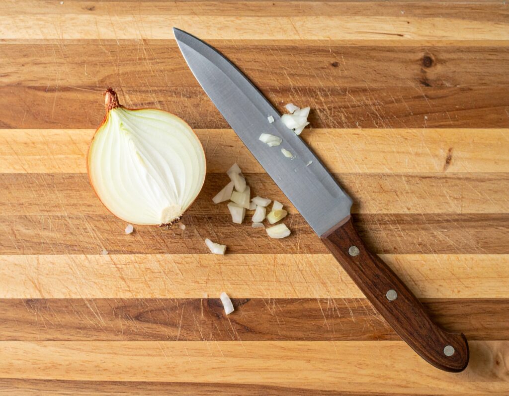 how to cut an onion without crying, onion tears, onion cutting tricks, why onions make you cry